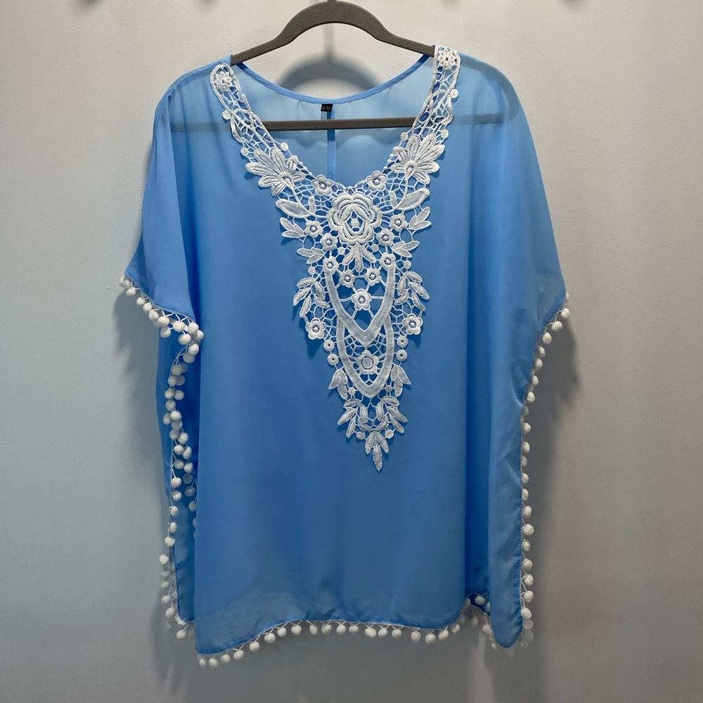 Blue Poncho with White Lace Detail